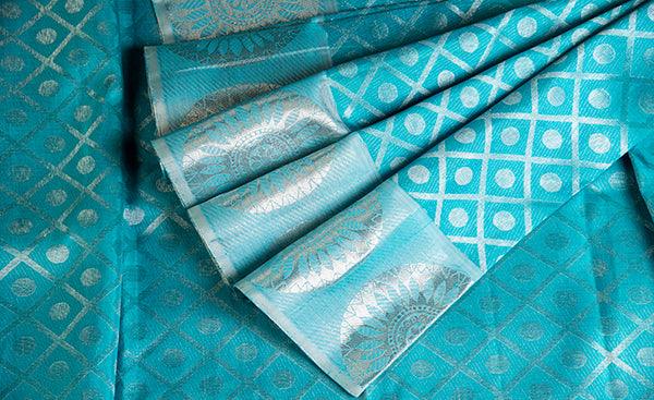 Teal Blue Folklore Handloom Silk Saree