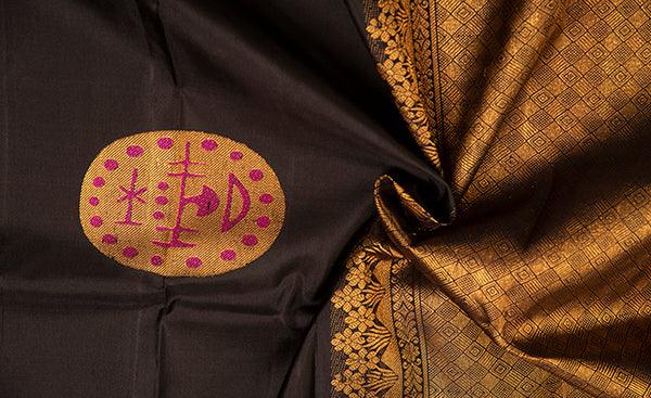 Black kanchipuram silk saree with silver silk thread border